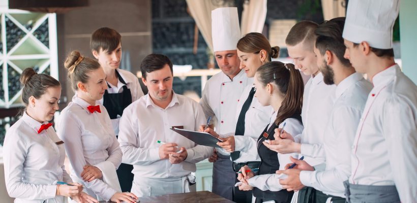 Restaurant,Manager,And,His,Staff,In,Terrace.,Interacting,To,Head