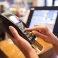 Woman,Hand,With,Credit,Card,Swipe,Through,Terminal,For,Sale