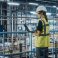 Female,Car,Factory,Engineer,In,High,Visibility,Vest,Using,Laptop