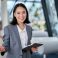 Happy,Young,Asian,Saleswoman,Looking,At,Camera,Welcoming,Client.,Smiling